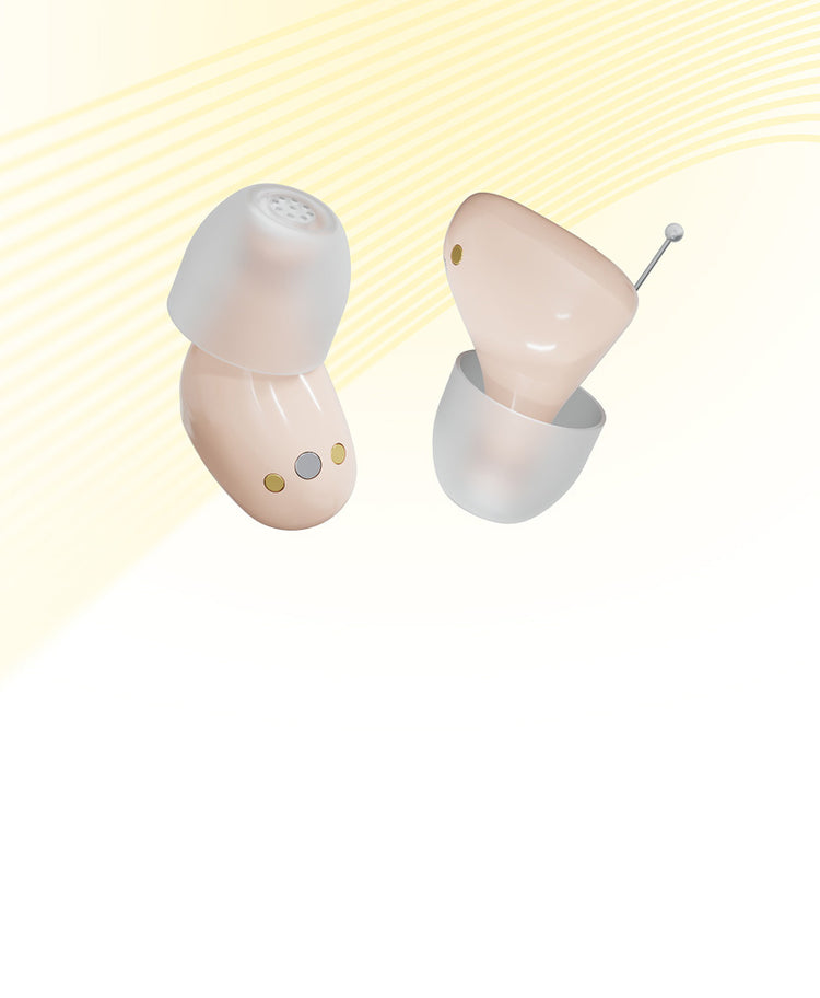 Two small, round, beige lamps on a white background with a yellow gradient.
